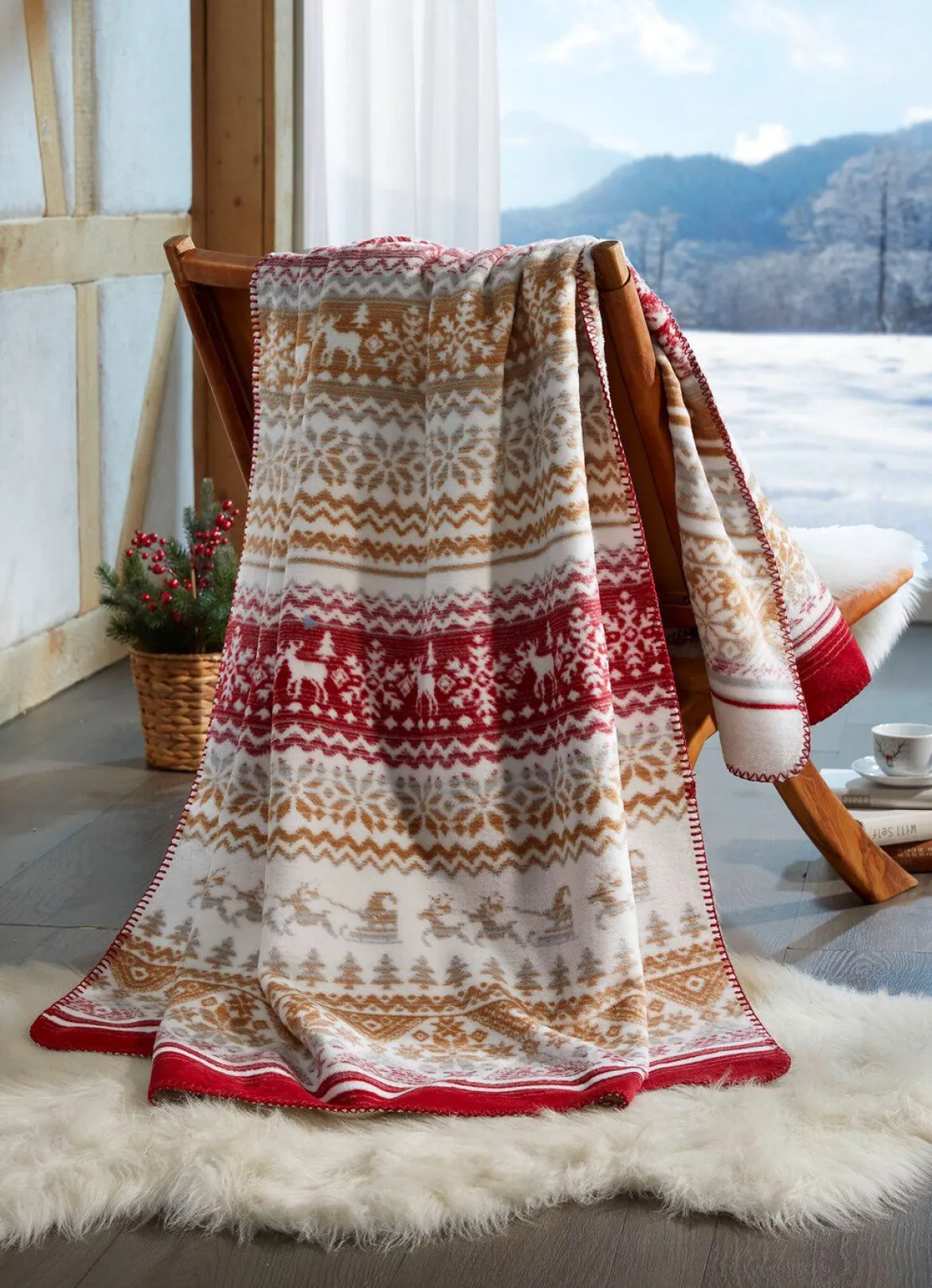 Kuschelige Wohndecke mit winterlichen Motiven