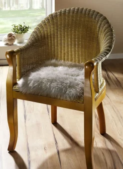 Merino-Lammfell-Sitzauflage in Tierform