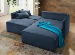 Polsterecke mit Bettfunktion und Hocker