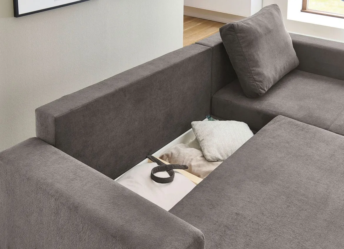 Polsterecke mit Bettfunktion und Bettkasten