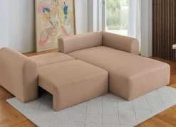 Polsterecke mit Bettfunktion und Dekokissen