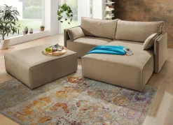 Polsterecke mit Bettfunktion und Hocker