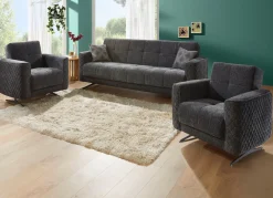 Polstermöbel mit Bettfunktion und Dekokissen