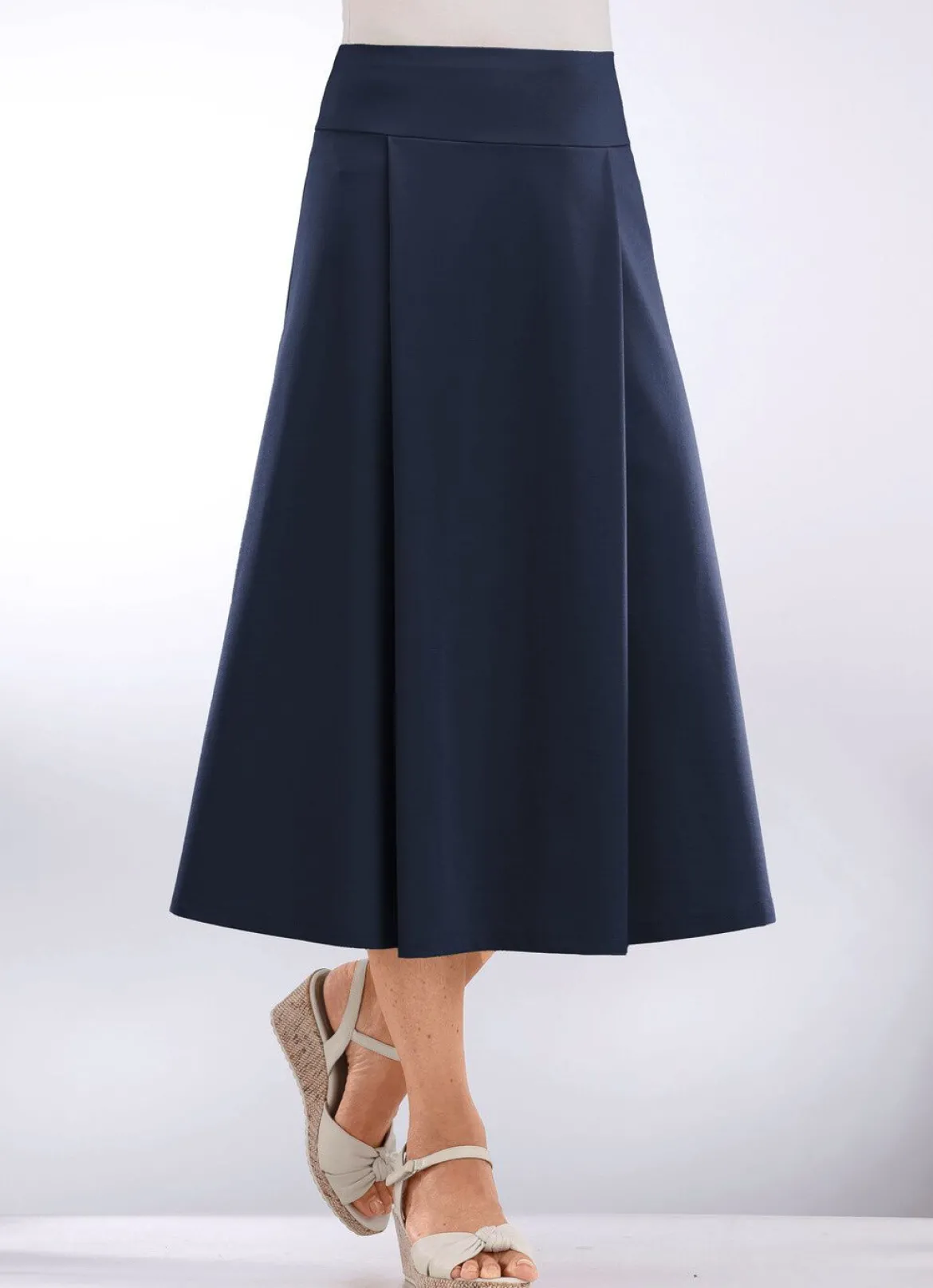Rock mit gelegten Falten
